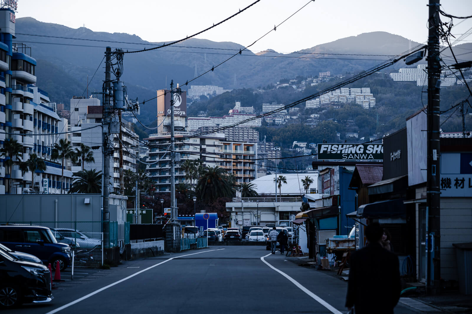 coastal walking shot looking down the port area near the Atami ropeway station in Shizuoka