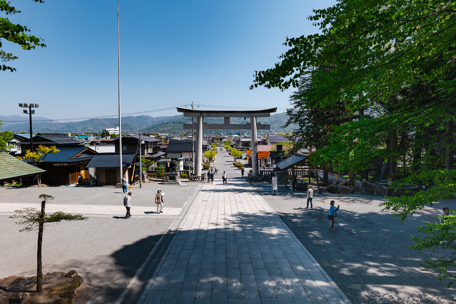 Open entrance area near shrine approach at Suwa Taisha Kamisha Honmiya, Suwa