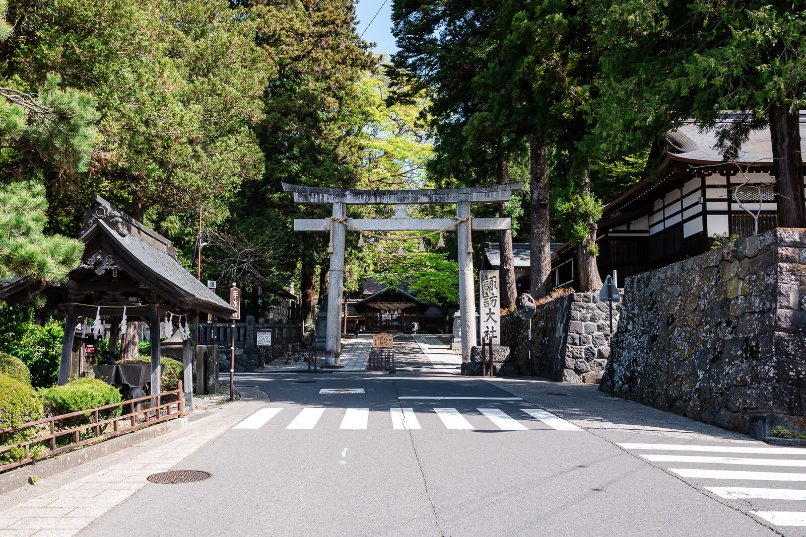 Second torii gate and chozuya purification basin at Suwa Taisha Shimosha Harumiya