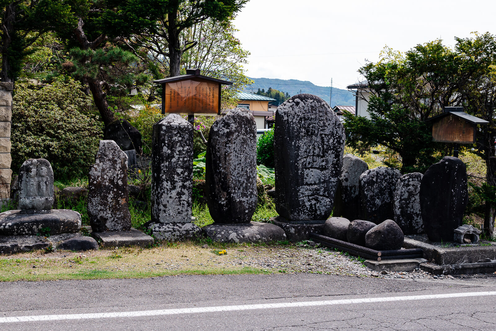 Roadside stone Buddha statues near Suwa Taisha Shimosha Harumiya in Shimosuwa