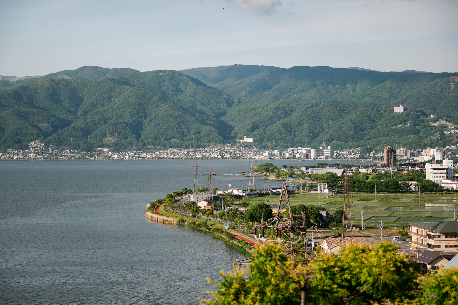 Elevated view of Lake Suwa and surrounding mountains from Suwako Service Area in Nagano