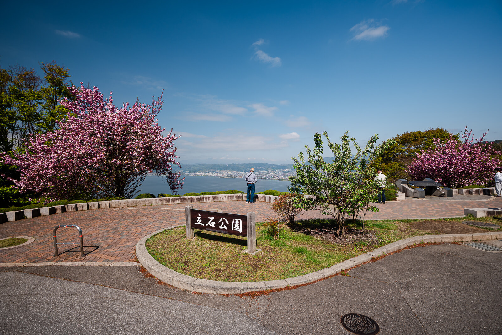 Tateishi Park entrance sign and observation area overlooking Lake Suwa
