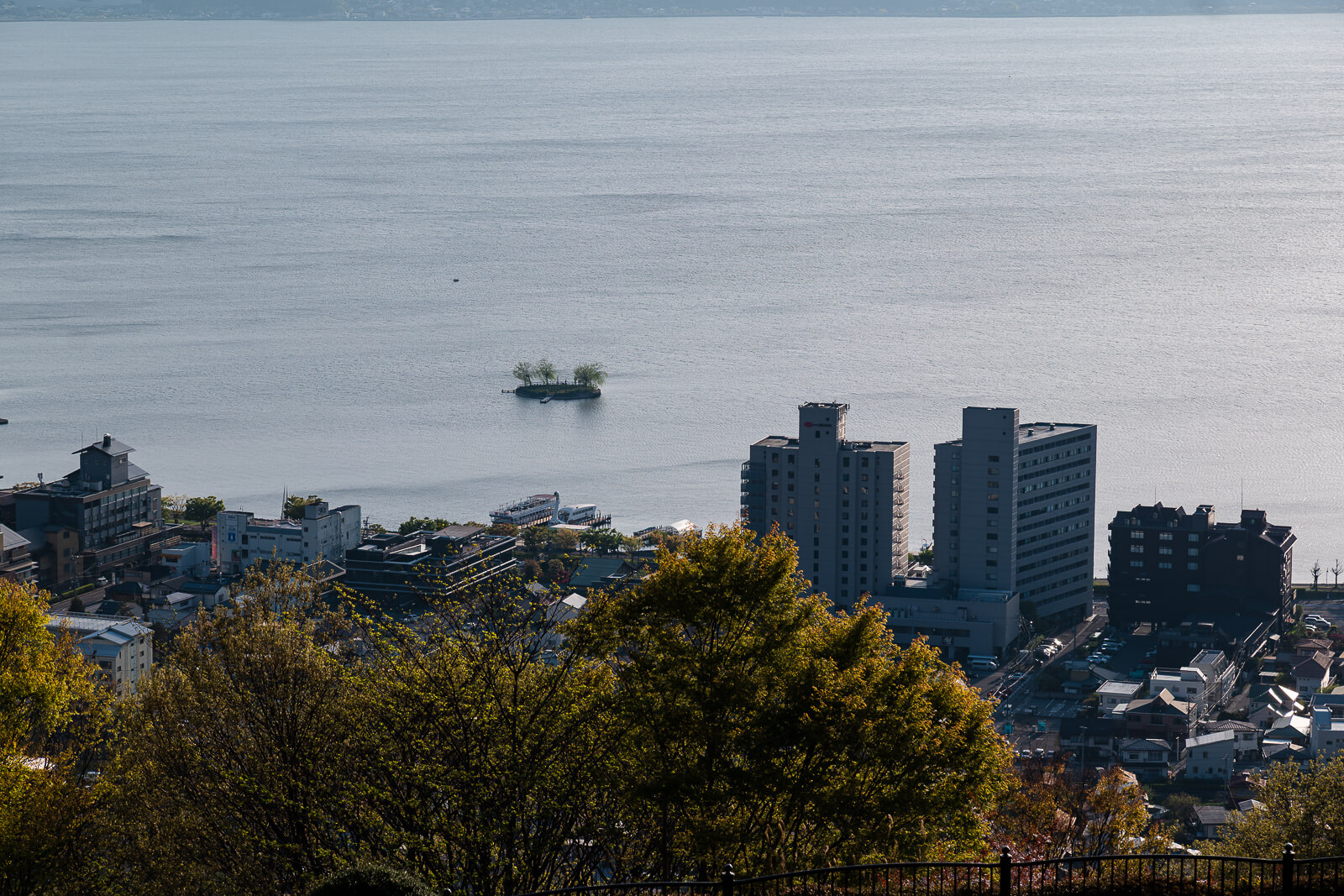 Lake Suwa shoreline and floating island viewed from Tateishi Park in Suwa City