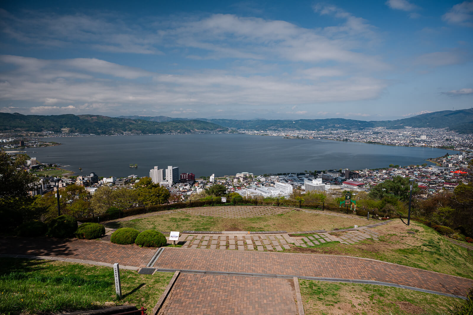 Wide panorama of Lake Suwa basin viewed from Tateishi Park in Nagano